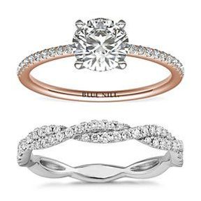 A bridal set where the engagement ring is rose gold and the band is white gold both have micropavé set diamonds.